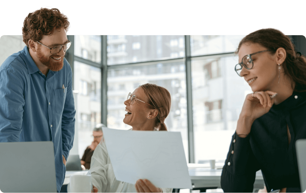 group-business-people-discussing-something-smiling-while-sitting-office-table