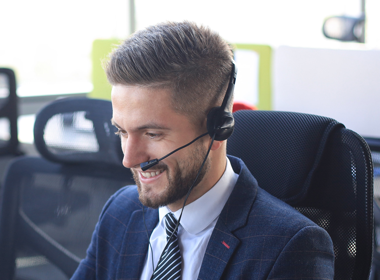 portrait-call-center-worker-accompanied-by-his-team-smiling-customer-support-operator-work