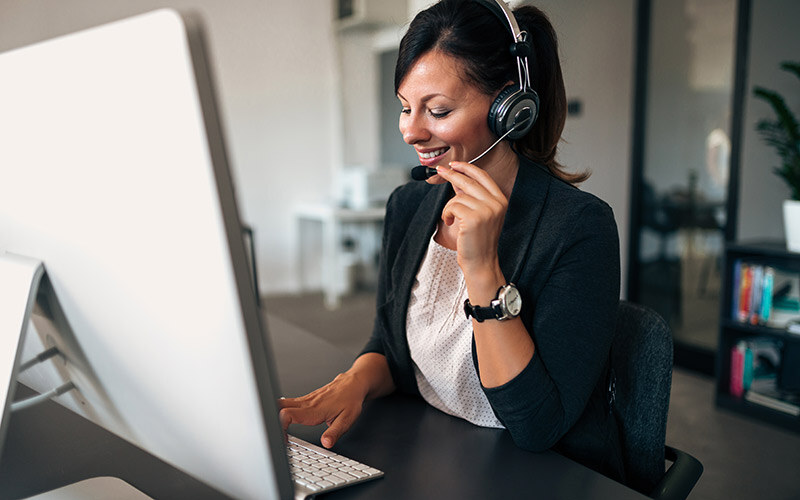 young-customer-support-representative-talking-with-client-thumb